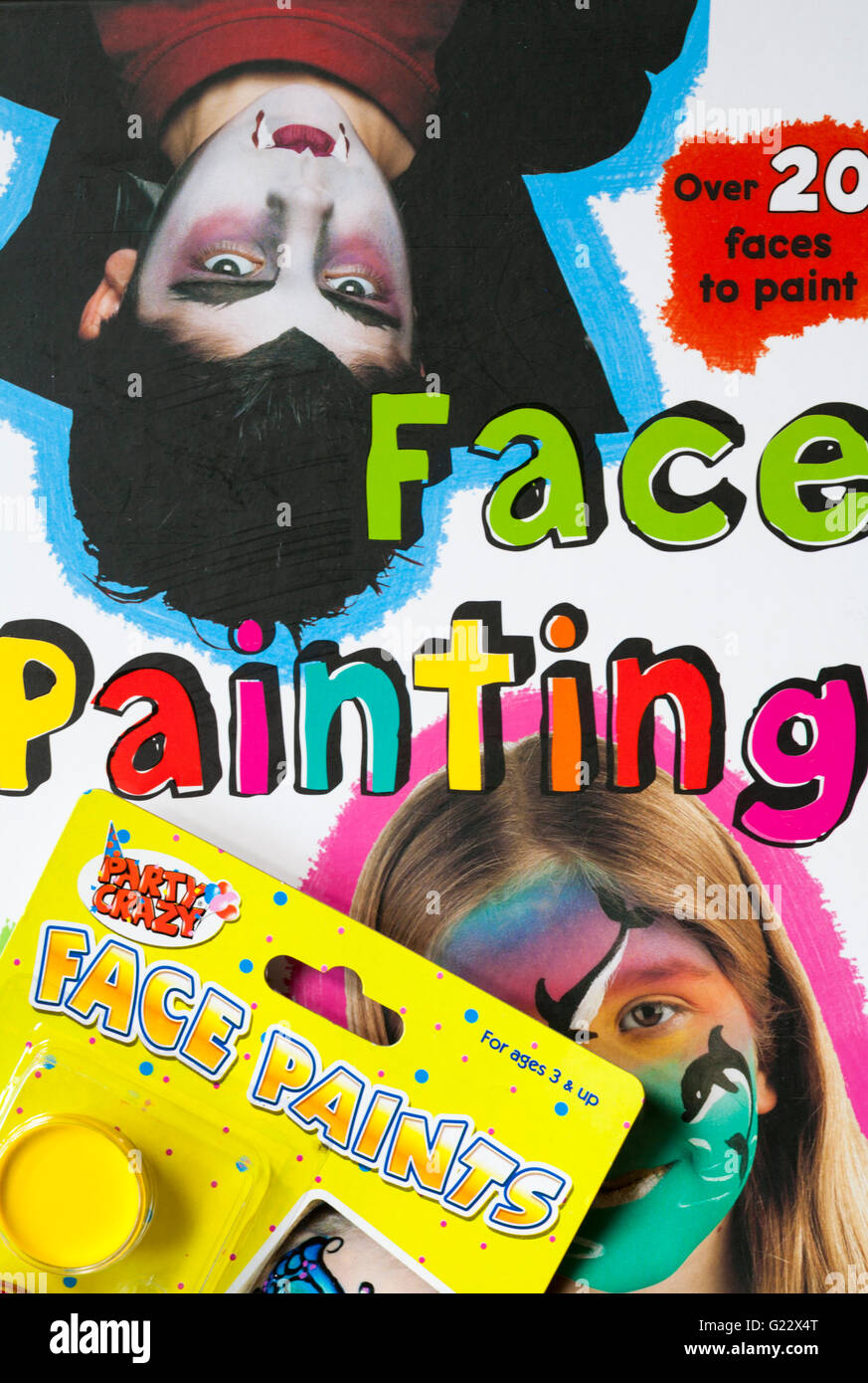 Face Painting book with pack of Party Crazy Face Paints Stock Photo Alamy