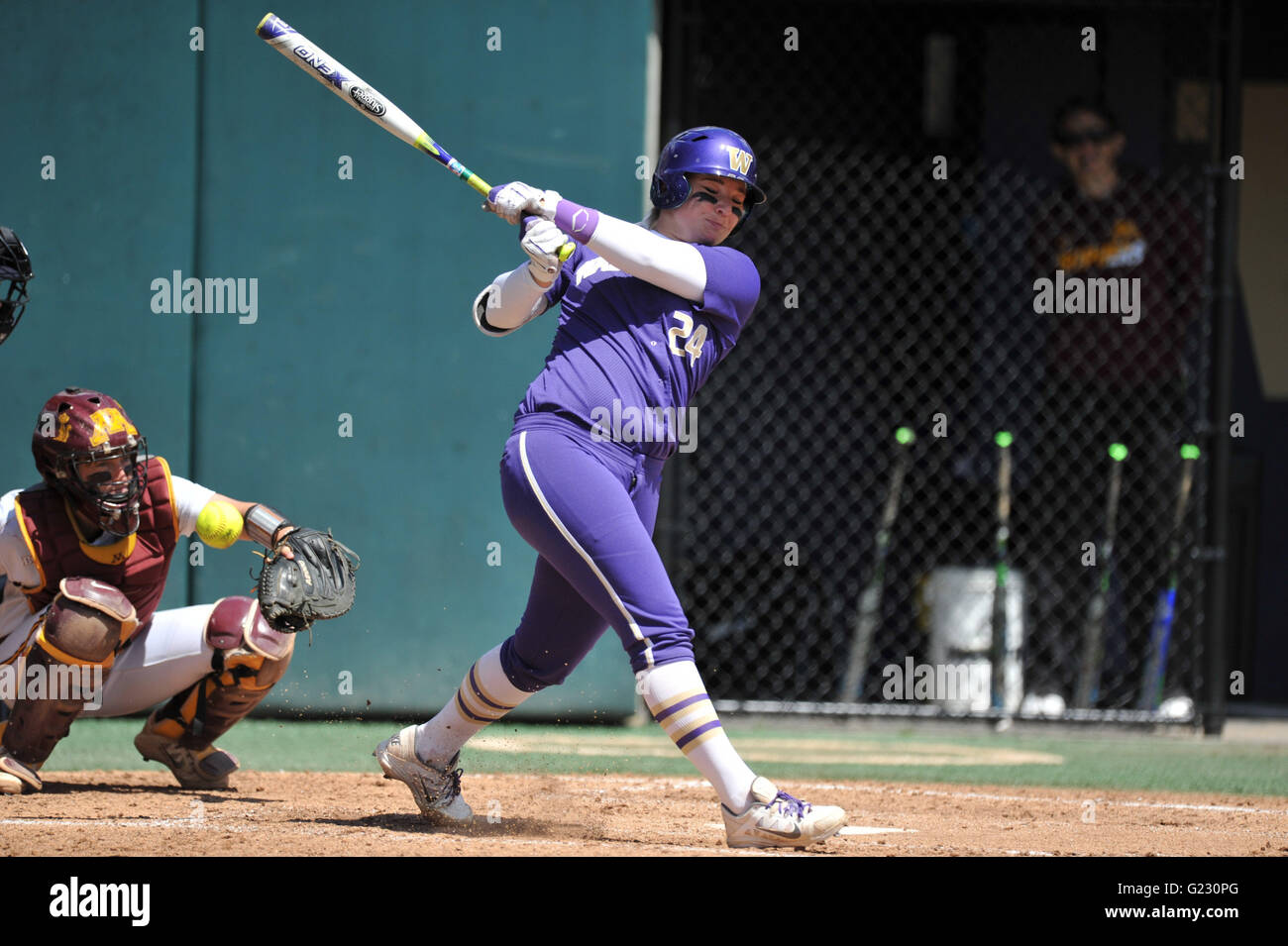 Washington's Casey Stangel (24) swings at a pitch during the NCAA Regional Final softball game against Minnesota. UW won the NCAA Regional final game 15-7 against Minnesota in Seattle. Jeff Halstead/CS Media © Jeff Halstead/Cal Sport Media Stock Photo