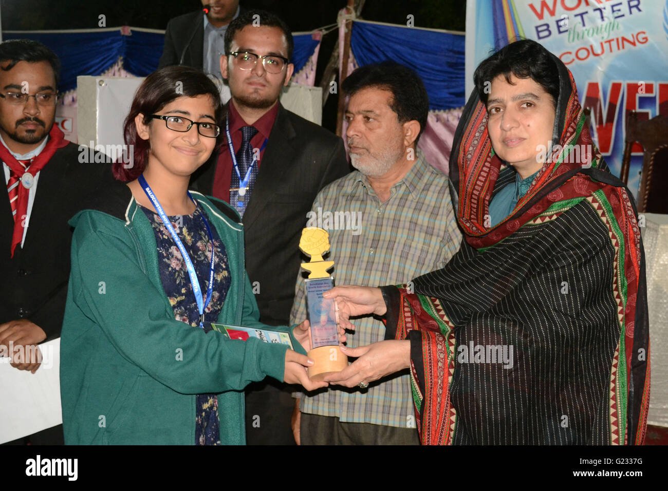 Quetta, Pakistan. 22nd May, 2016. Speaker Balochistan Assembly and chief commissioner for boy scouts Madam Raheela Hameed Khan Durrani giving the award of best performance to participant during the closing ceremony of three days event Model United Nations Quetta 'MunQta' Organized by Balochistan Boy Scouts Association held at Boy scouts association. Credit: Din Muhammad Watanpaal/ZMA Photos/Alamy Live News Stock Photo