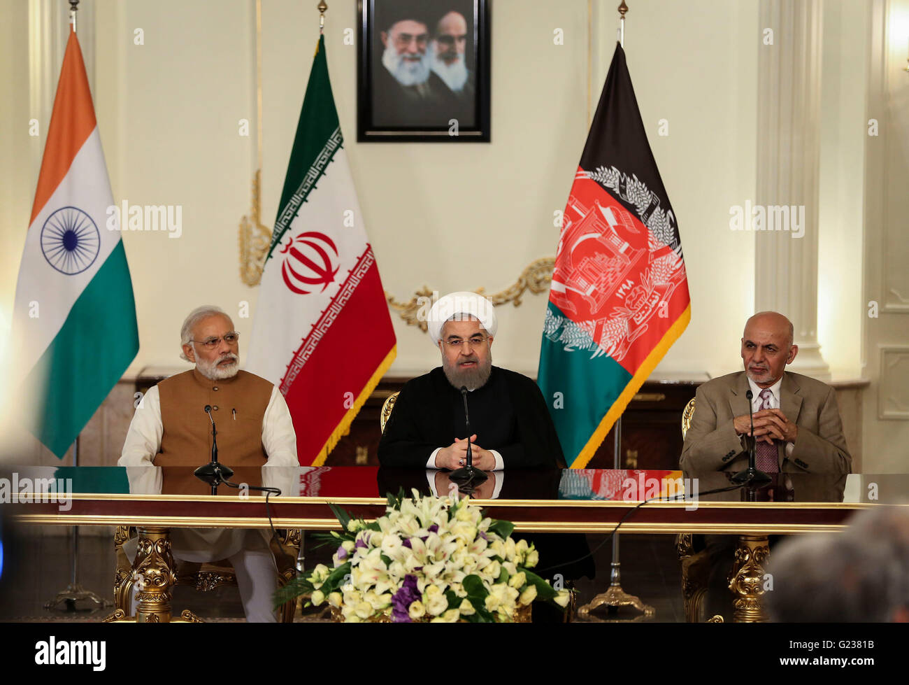 (160524) -- TEHRAN, May 24, 2016 (Xinhua) -- (From L to R) Indian Prime Minister Narendra Modi, Iranian President Hassan Rouhani and Afghan President Ashraf Ghani attend a meeting at Saadabad Palace in Tehran, Iran, on May 23, 2016. Iran, India and Afghanistan signed a trilateral deal here on Monday to boost their regional trade and economic cooperation. The agreement, signed in the presence of Iranian President Hassan Rouhani, Indian Prime Minister Narendra Modi and Afghan President Ashraf Ghani, is to develop Iran's Chabahar port, which would serve as a transit route connecting the three cou Stock Photo