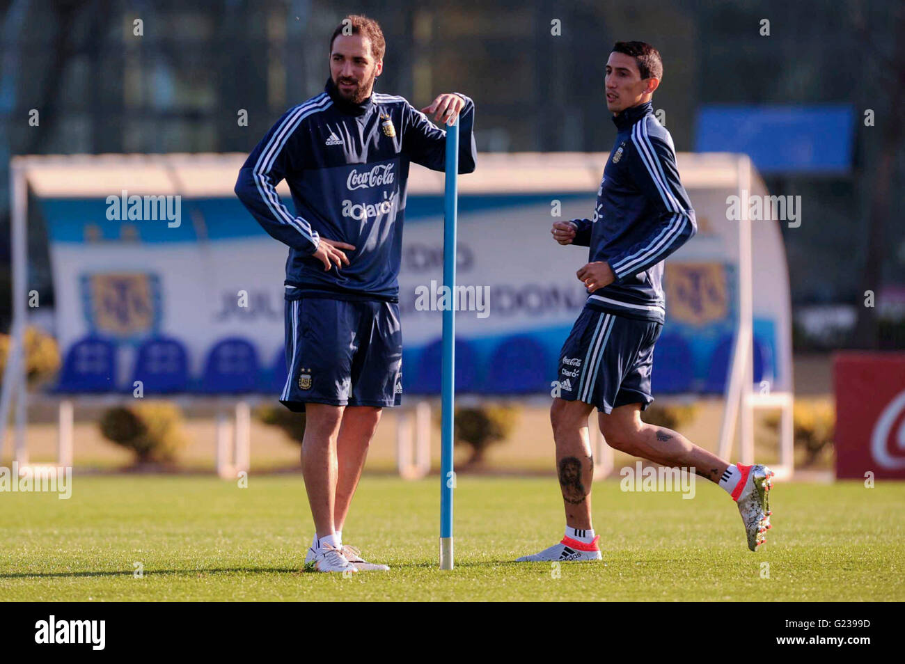 Buenos Aires, Argentina. 23rd May, 2016. Players Gonzalo Higuain (L) and Angel Di Maria (R), of Argentina's national soccer team, take part in a training session in the Julio Grondona grounds, in Buenos Aires, capital of Argentina, on May 23, 2016. Argentina will face Honduras in a friendly match on May 27. Credit:  Julian Alvarez/TELAM/Xinhua/Alamy Live News Stock Photo
