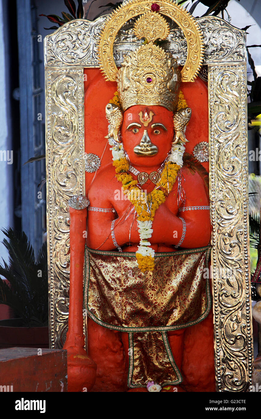 Vermilion painted and decorated idol of Anjaneya at Ram Mandir in Mandu, Madhya Pradesh, India, Asia Stock Photo