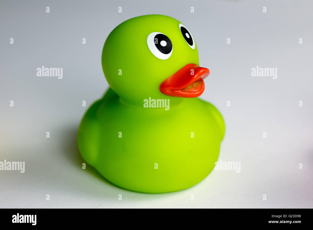 Bright green rubber duck Stock Photo