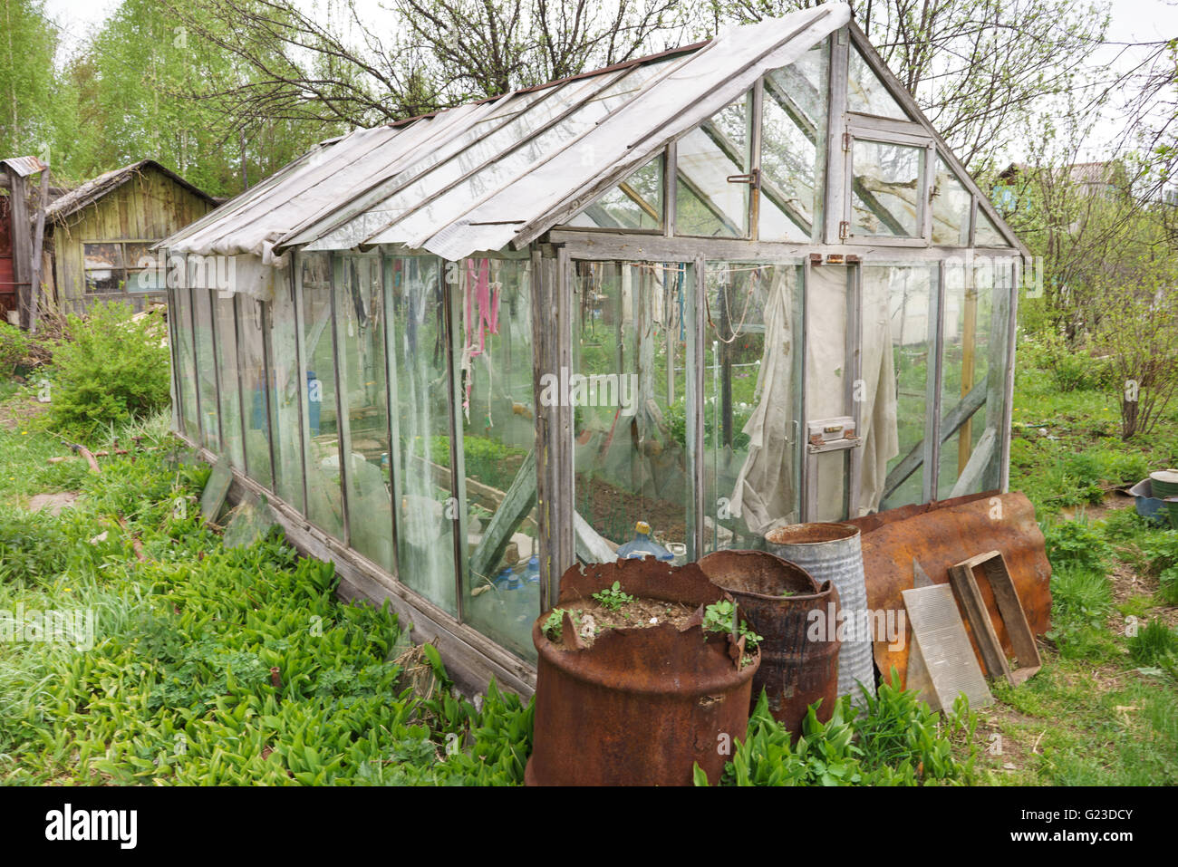 A small greenhouse with air vents in the garden Stock Photo Alamy