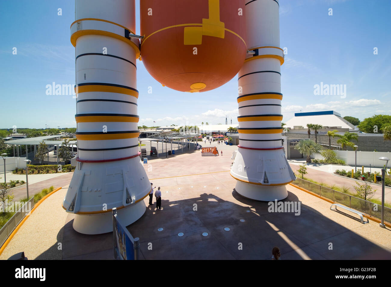 Boosters and fuel tank in front of the the entrance of the building where SPace Shuttle Atlantis is being exhibited Stock Photo