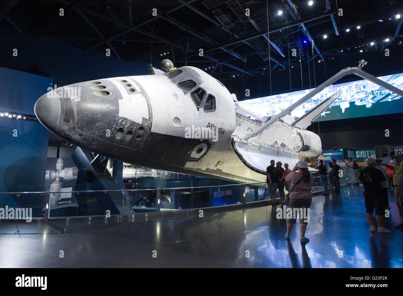 Visitors looking at Space Shuttle Atlantis which is exhibited at the visitor center of Kennedy Space Center Stock Photo
