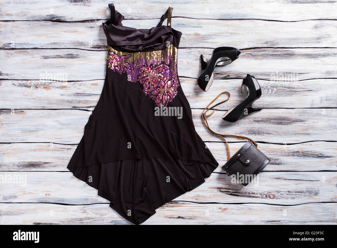 Black sleeveless dress and shoes. Stock Photo