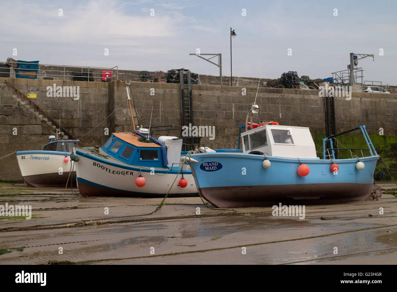 Fishing boats low tide in hi-res stock photography and images - Alamy
