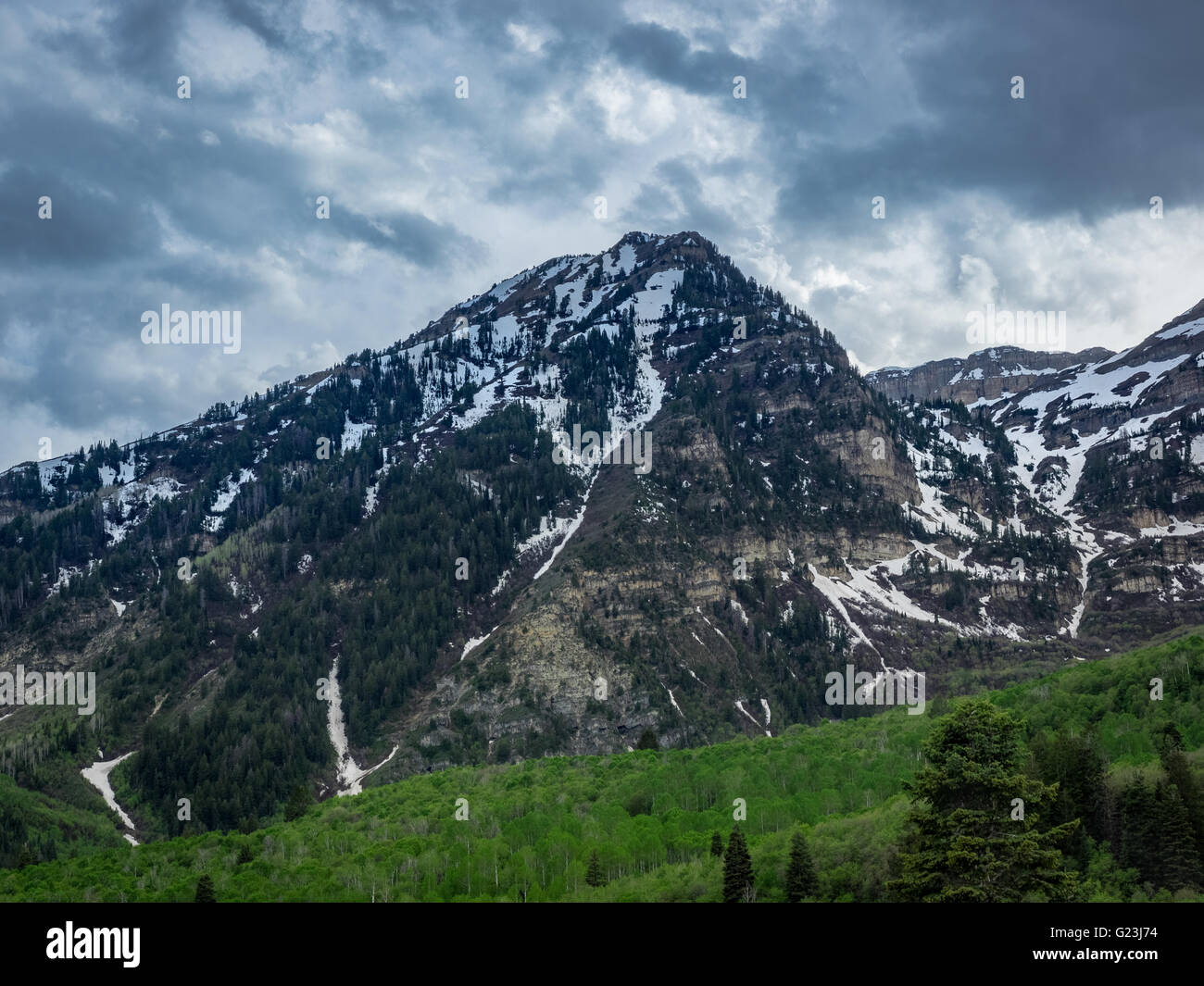 Rain clouds over the Wasatch Mountain Range. Stock Photo
