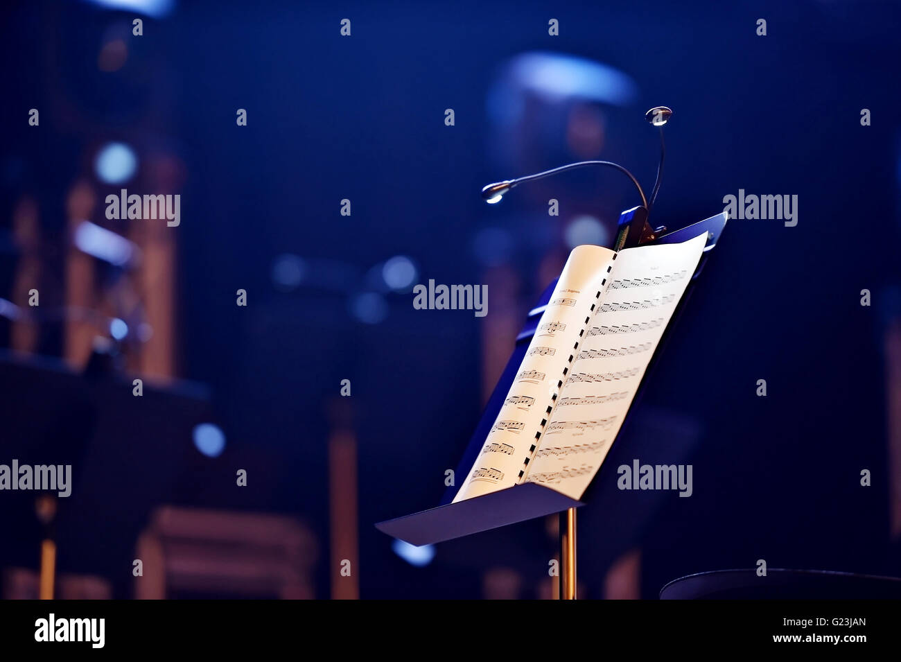 Music note stand with led lights during a concert Stock Photo