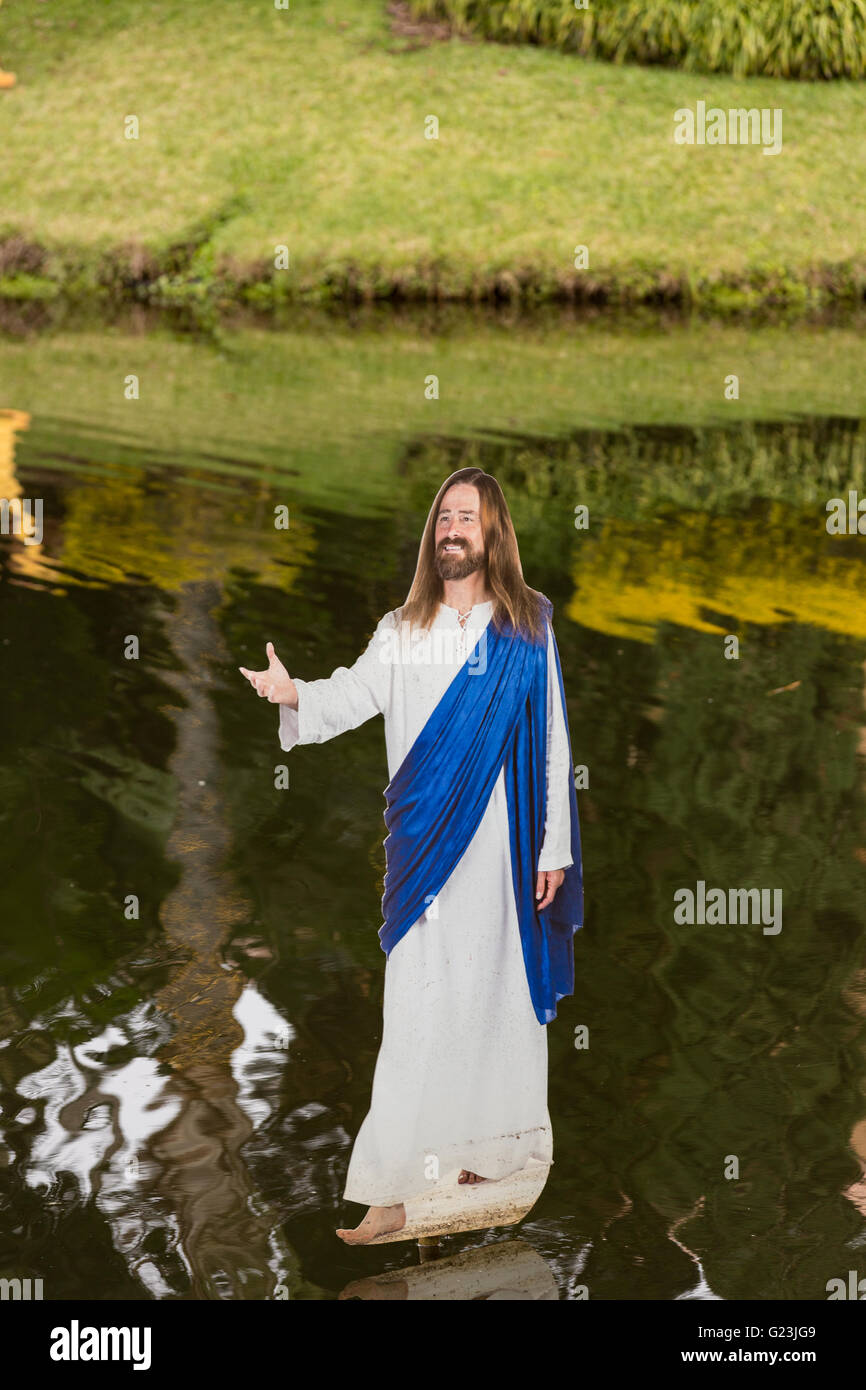 A cardboard cutout of Jesus Christ walking on water at the Holy Land Experience Christian theme park in Orlando, Florida. Stock Photo