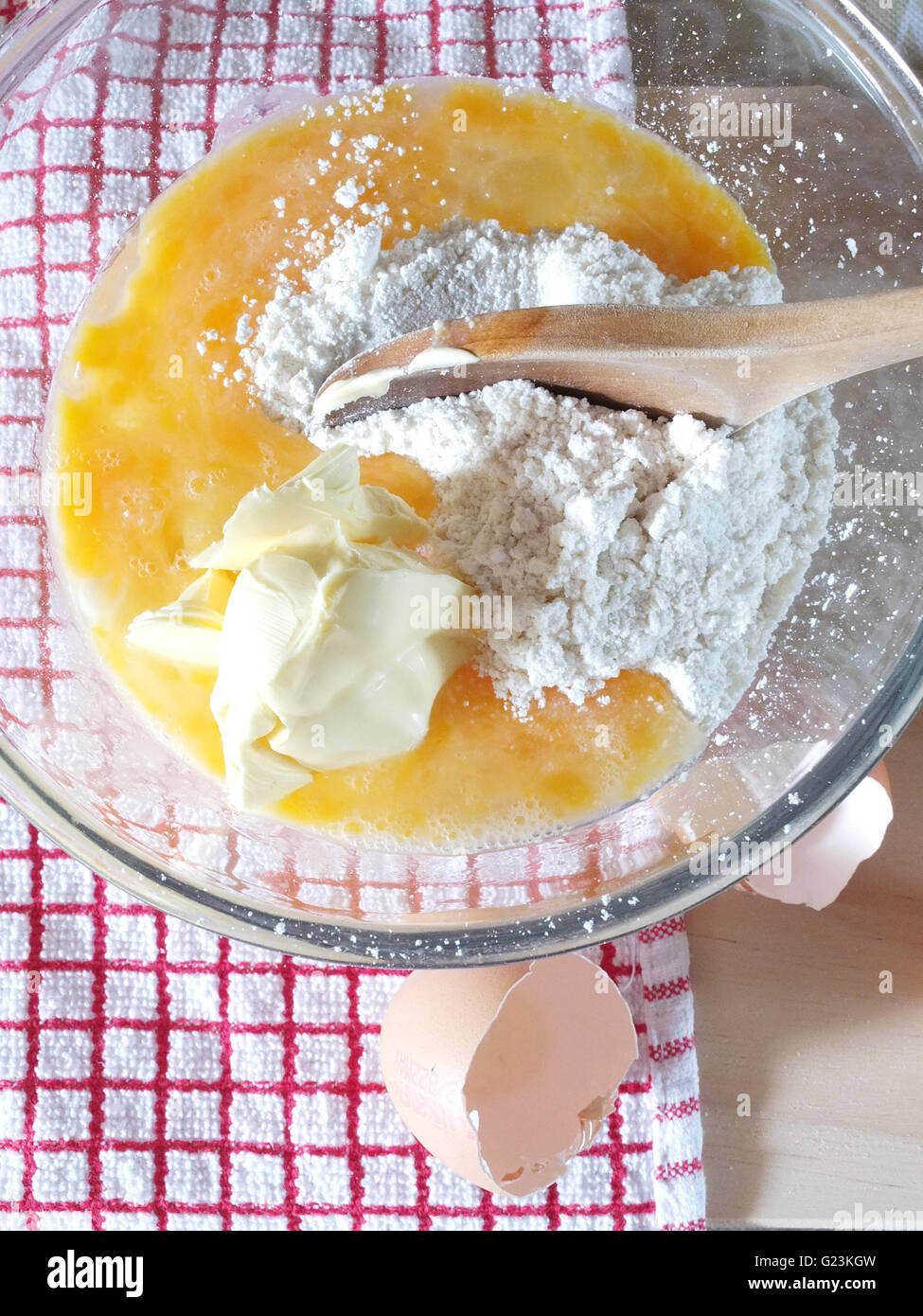 flour butter & egg in a mixing bowl Stock Photo Alamy
