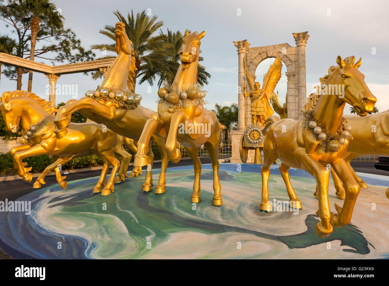 Golden galloping horse statues outside the Holy Land Experience Christian theme park in Orlando, Florida. Stock Photo