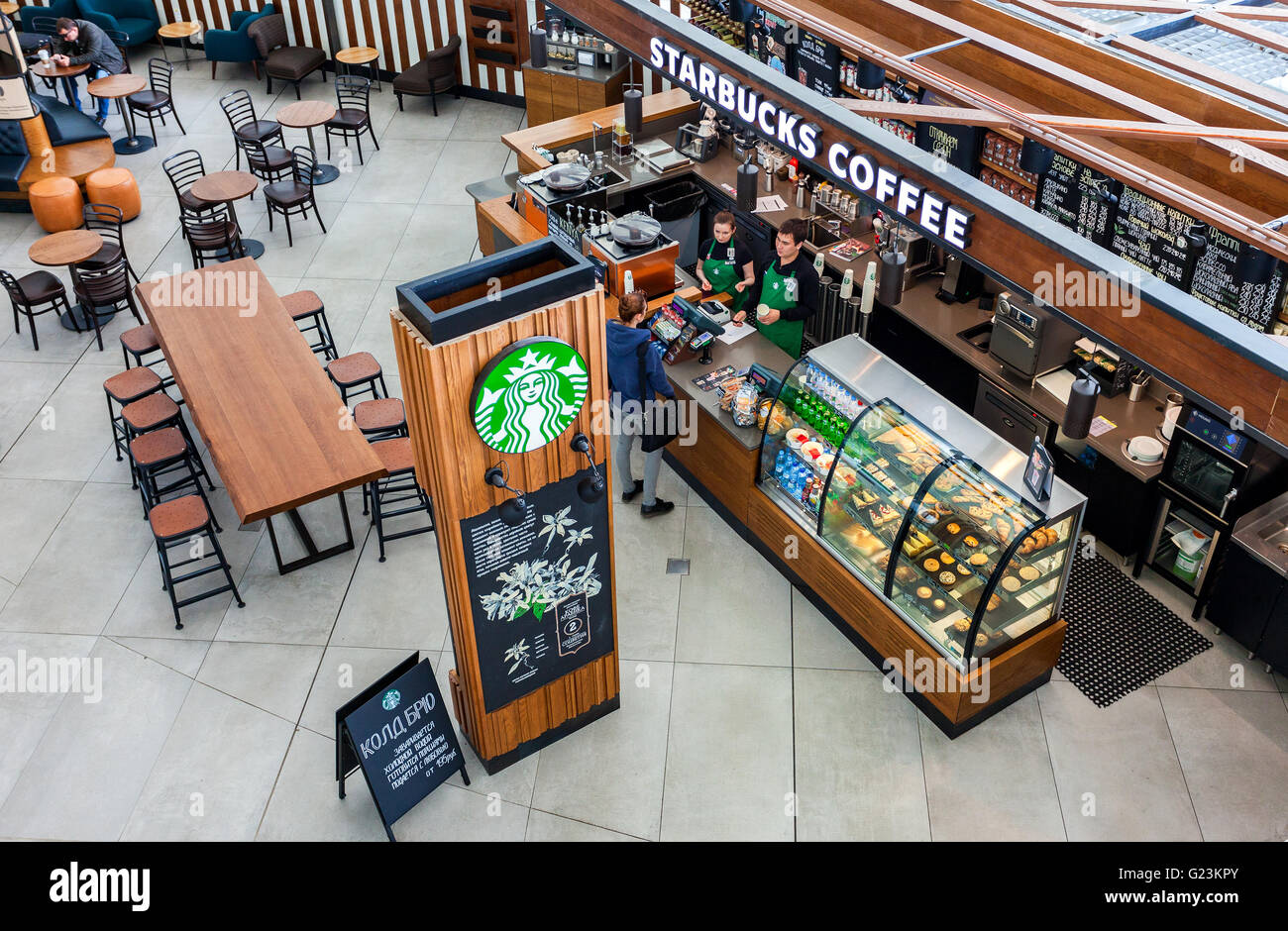 Starbucks cafe interior in Samara airport Kurumoch Stock Photo