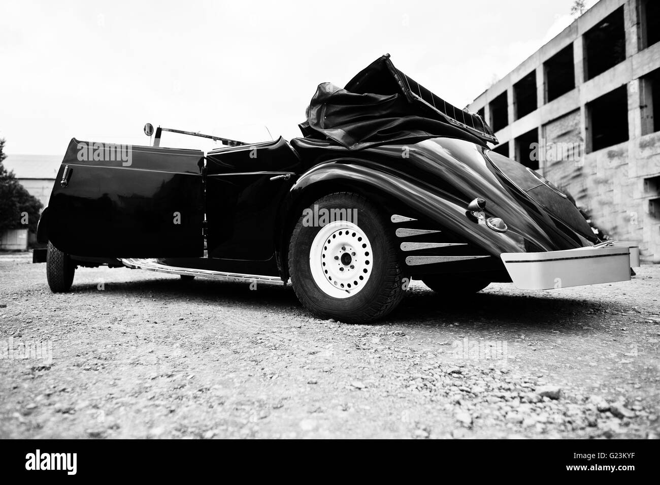 Side of the old vintage retro car. Black and white photo Stock Photo