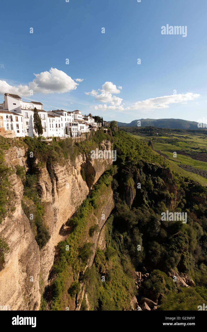 White houses perched on the edge of a cliff, in Ronda, an example of a Spanish White Town, Andalusia Spain Stock Photo