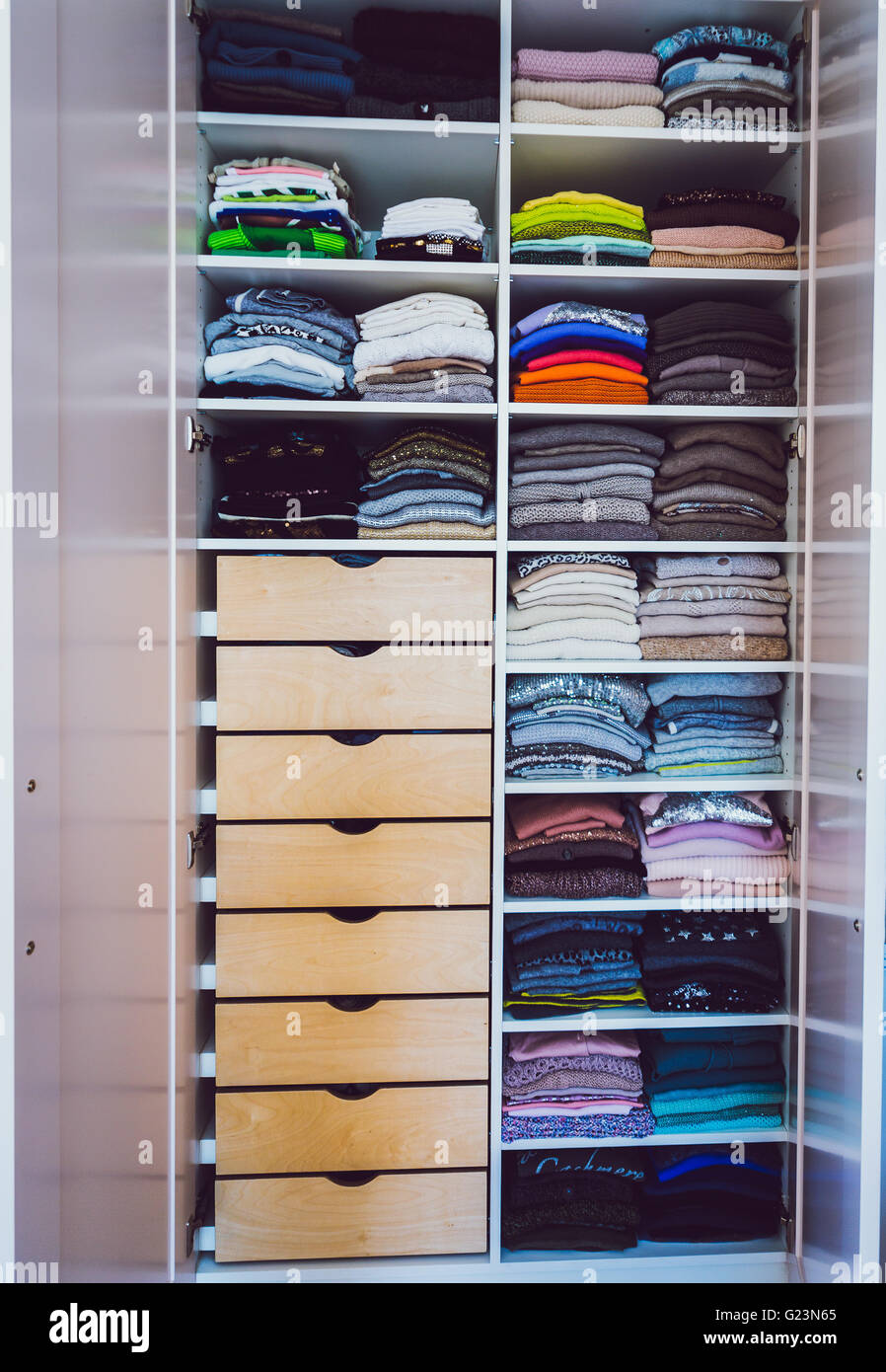 wardrobe with colorful clothes Stock Photo