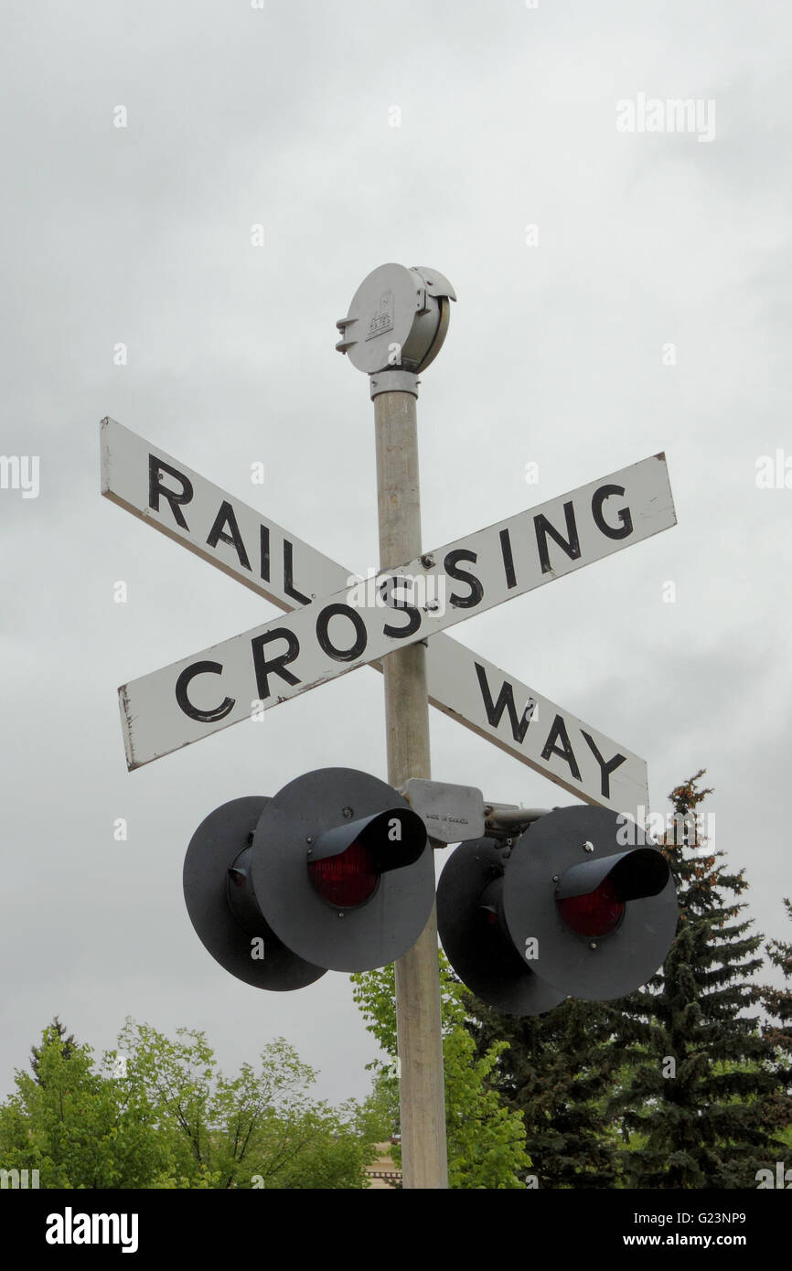 A railway crossing sign at Heritage Park, Alberta, Canada Stock Photo ...