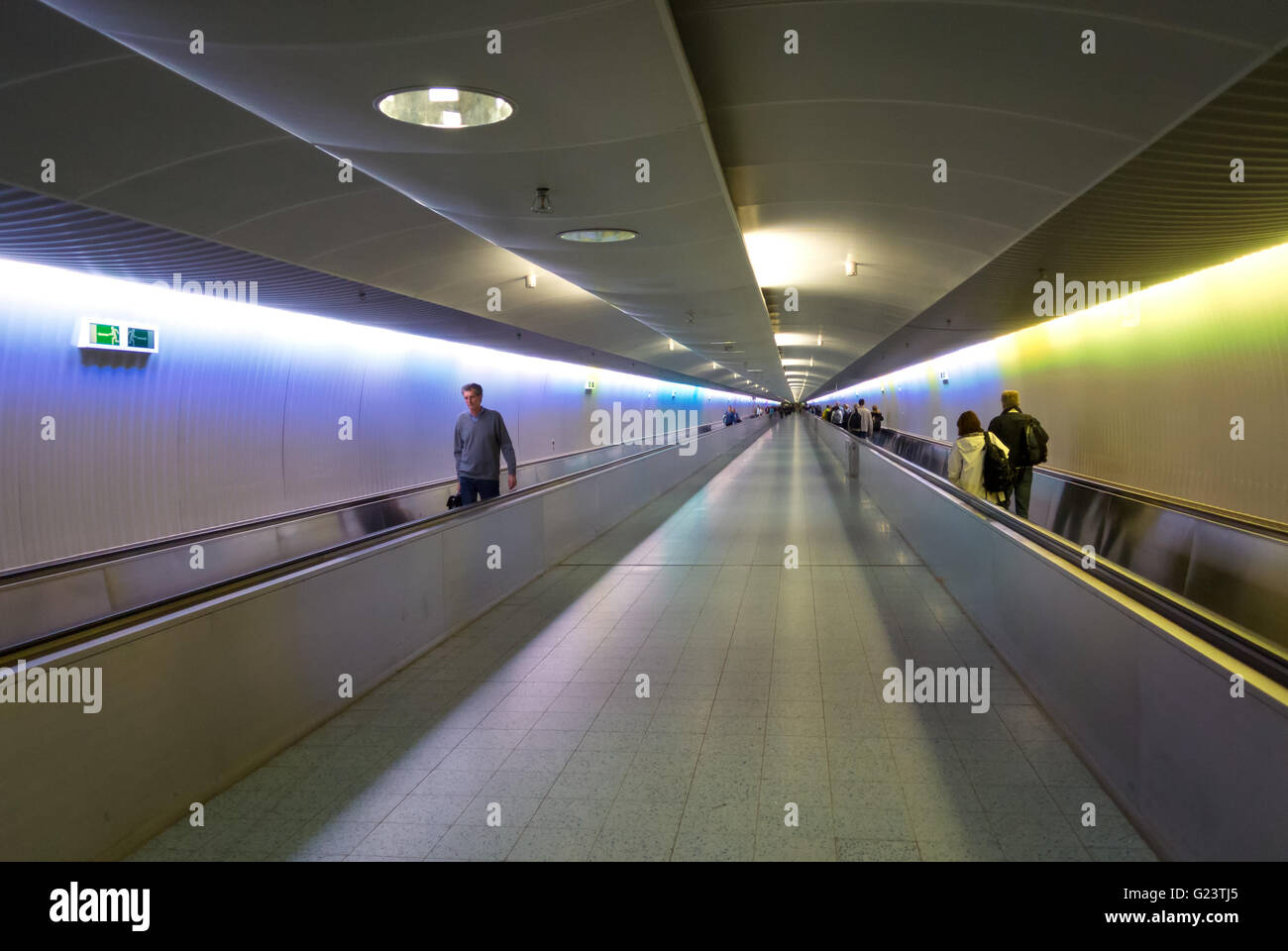 Transfer passengers on moving walkways or travelators at Frankfurt Airport, Germany.  Flughafen Frankfurt am Main. Stock Photo