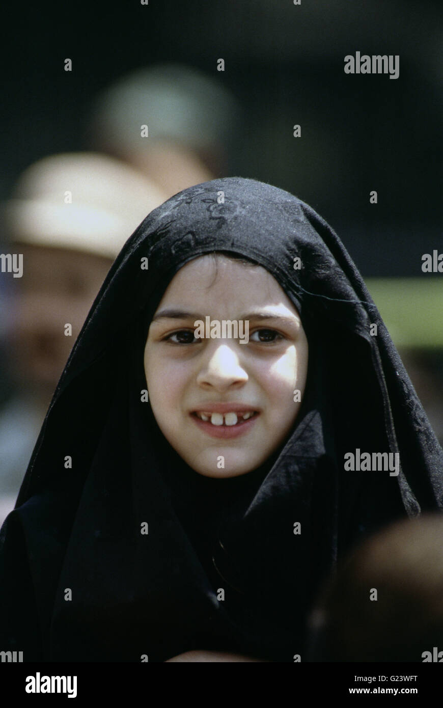 Portrait of an Iranian school girl. Stock Photo