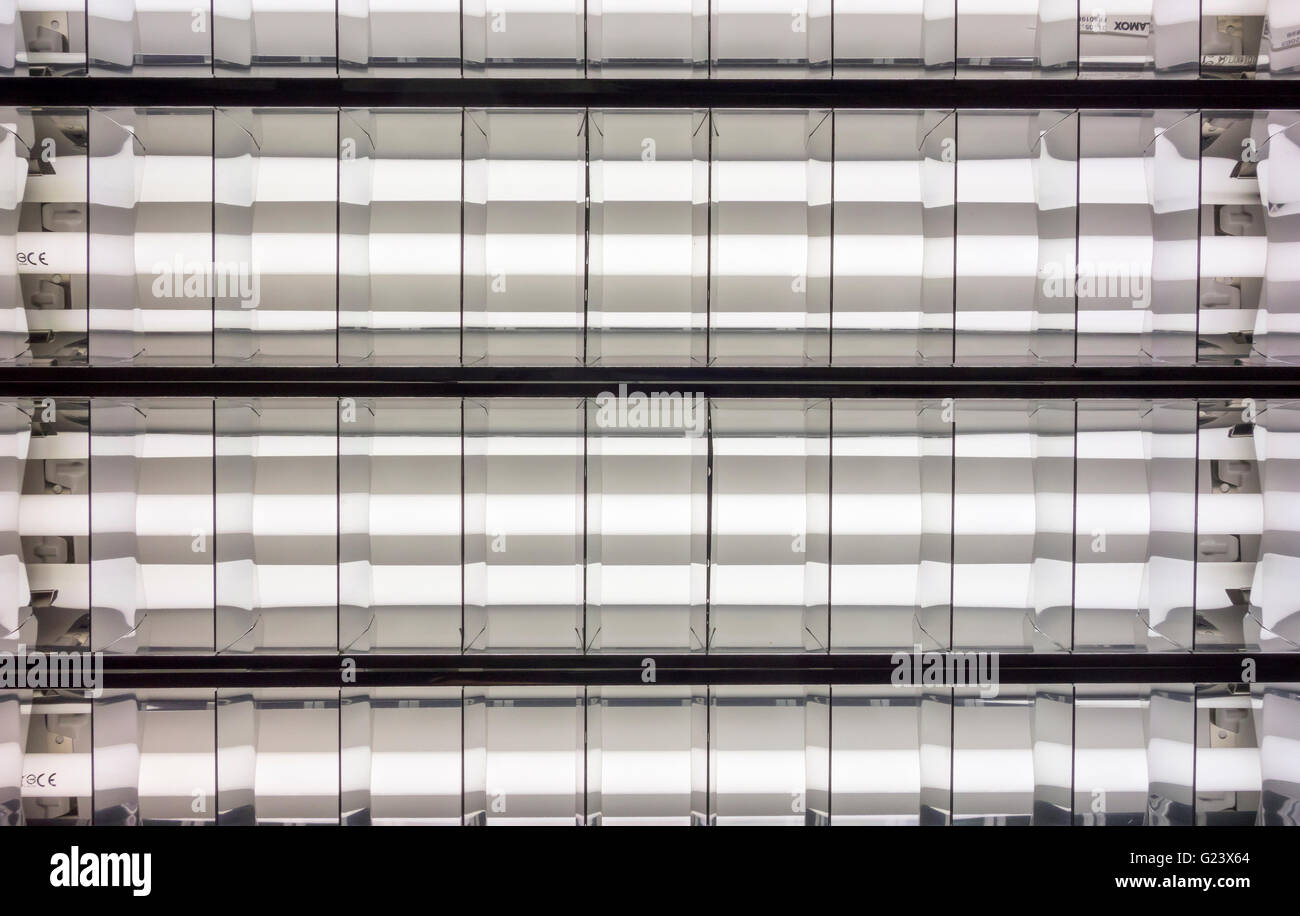 Fluorescent light fitting and tubes with reflectors to give maximum light output Stock Photo Alamy
