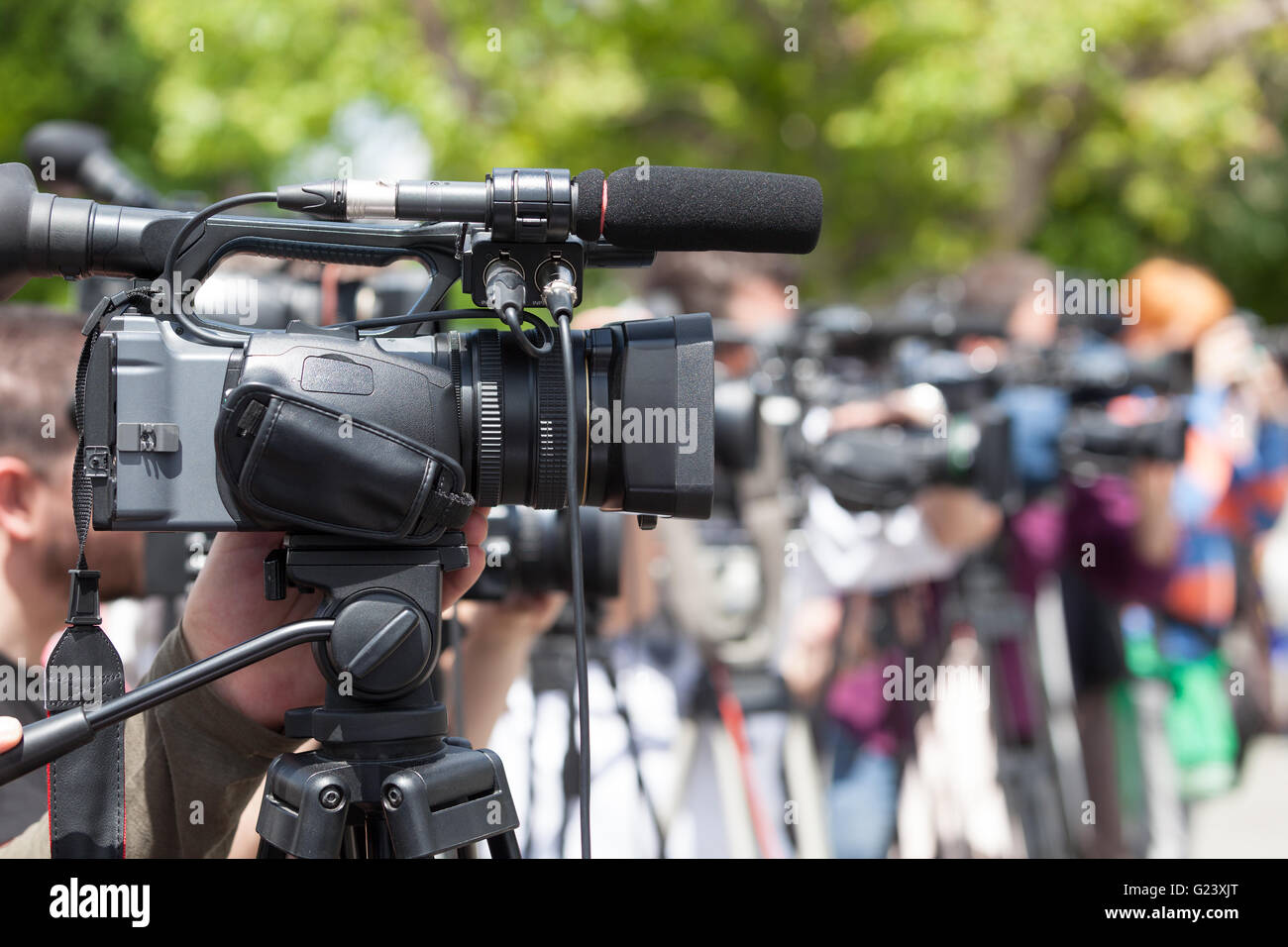 News conference. Covering an event with a video camera. Stock Photo