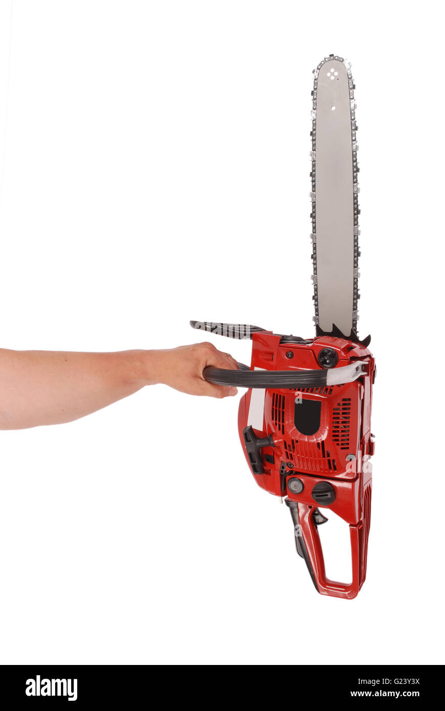 By one hand holding a chainsaw isolated on white Stock Photo