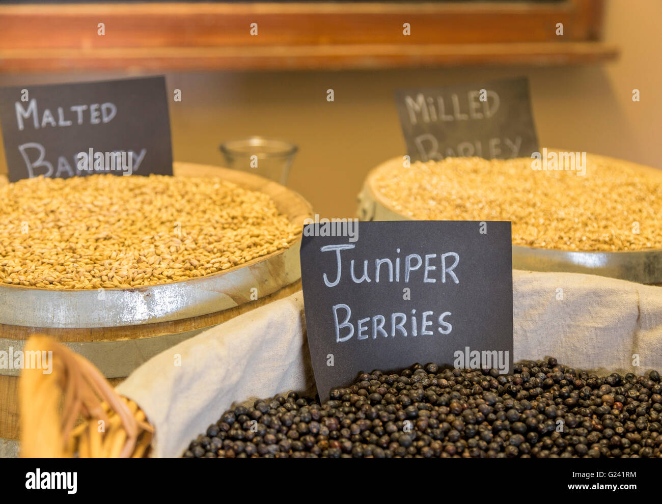 Whiskey ingredients: Juniper berries, malted barley, milled barley, at the Dingle Whiskey Distillery, Dingle, Co. Kerry, Ireland Stock Photo