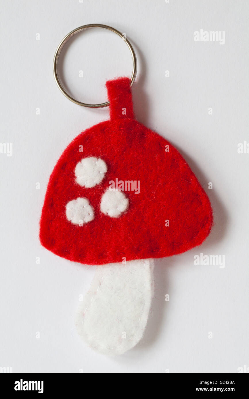 Handmade toadstool keyring key ring made from felt isolated on white ...