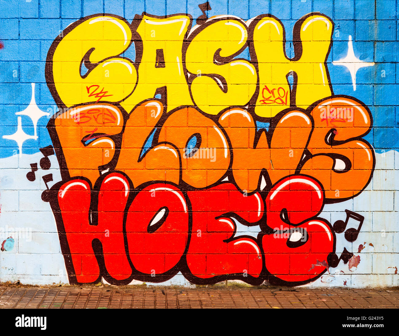 Graffiti Cartoon Words Sprayed on a wall, Barcelona, Catalonia, Spain. Stock Photo