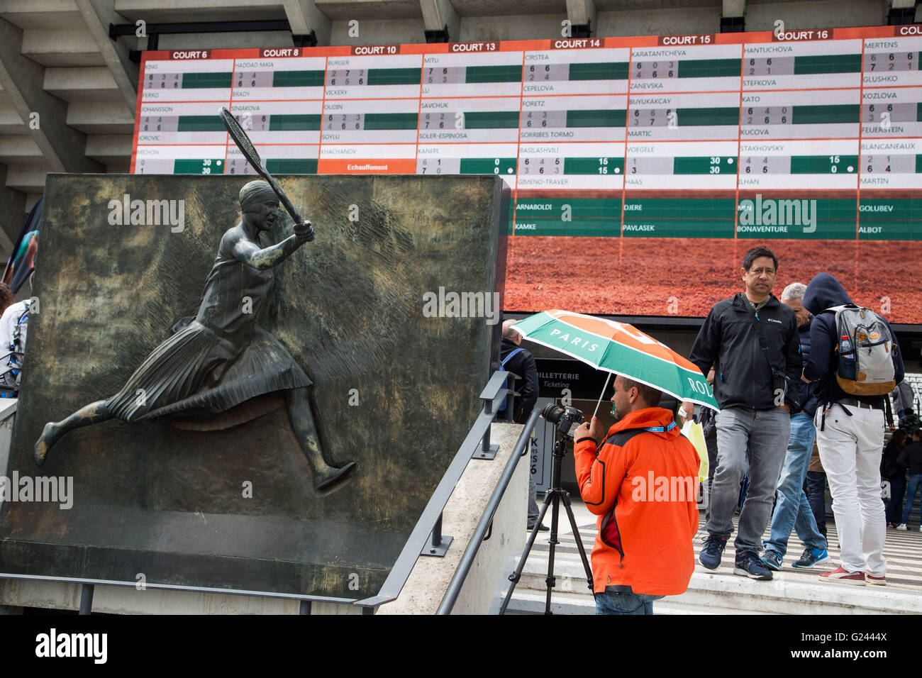 Time Lapse photographer photographing a scene at Roland Garros 2016 French Open Tennis Tournament, Paris, France Stock Photo