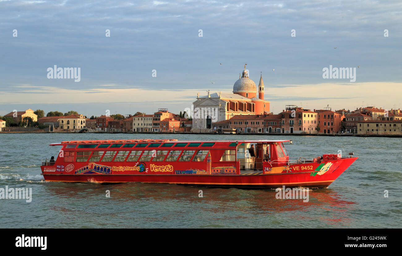 Hop-On Hop-Off sightseeing boat, Venice, in front of  Redentore church, Giudecca island. Stock Photo