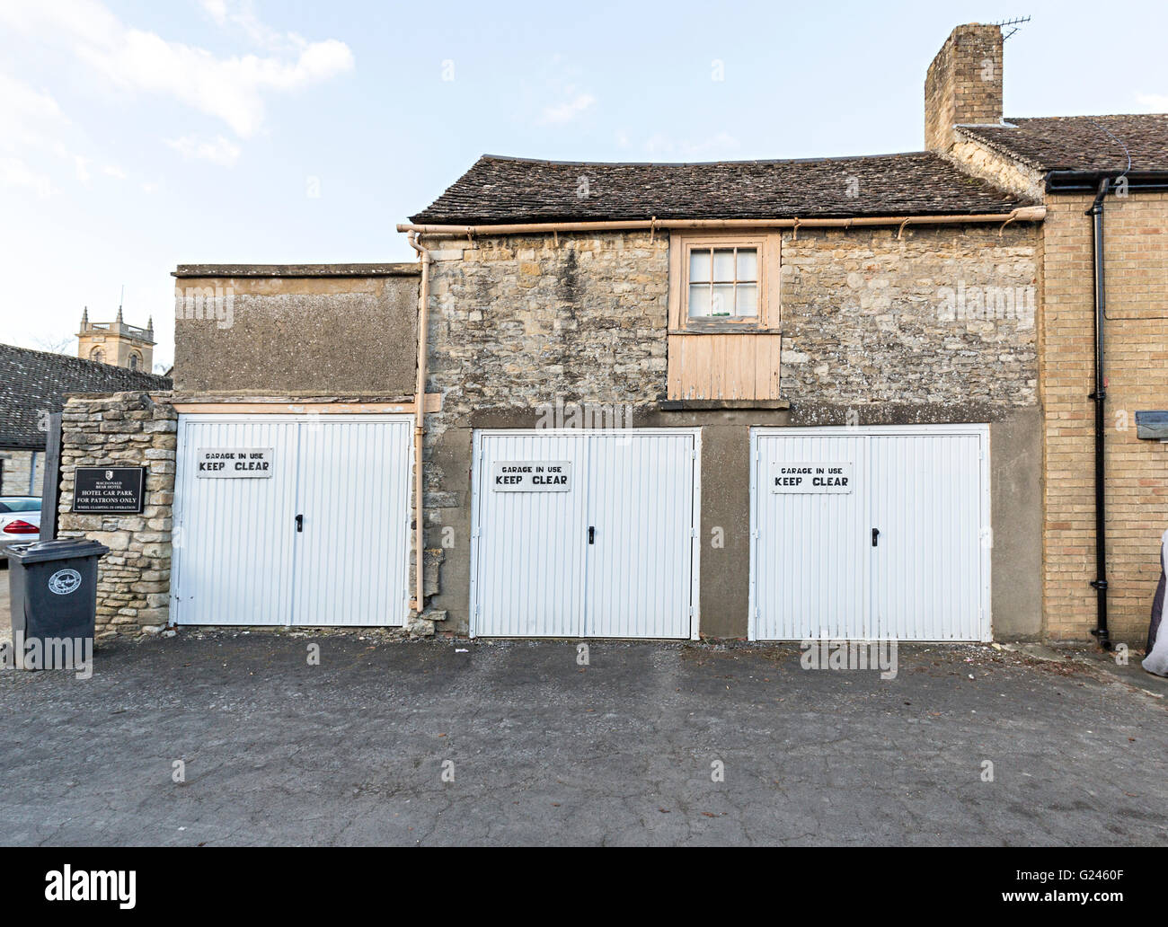 Three garages with keep clear signs, Woodstock, Oxfordshire, England, UK Stock Photo