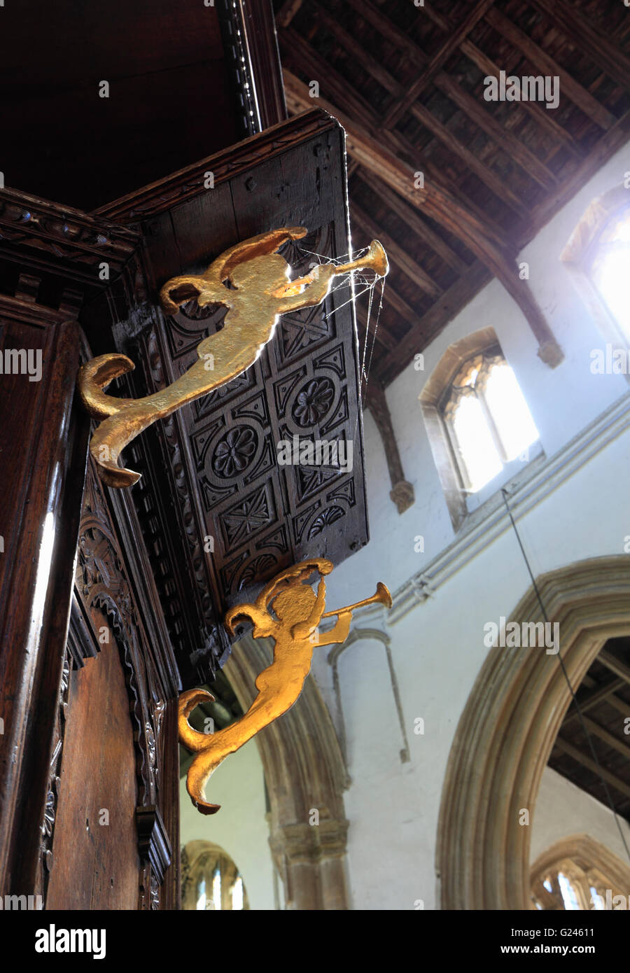 Golden angels with trumpets under the pulpit at the church of Walpole St Peter, Norfolk, UK. Stock Photo