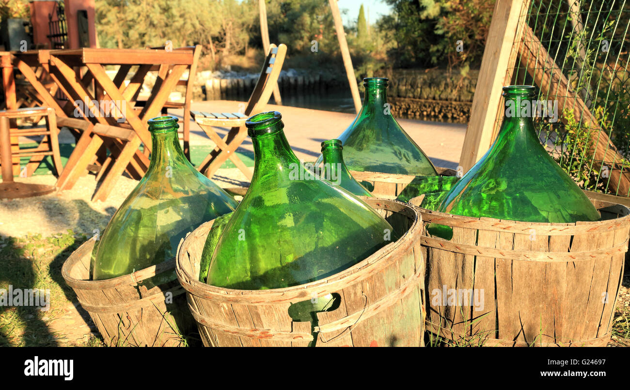 Demijohn wine bottles at Taverna Tipica, Torcello Island Stock Photo Alamy