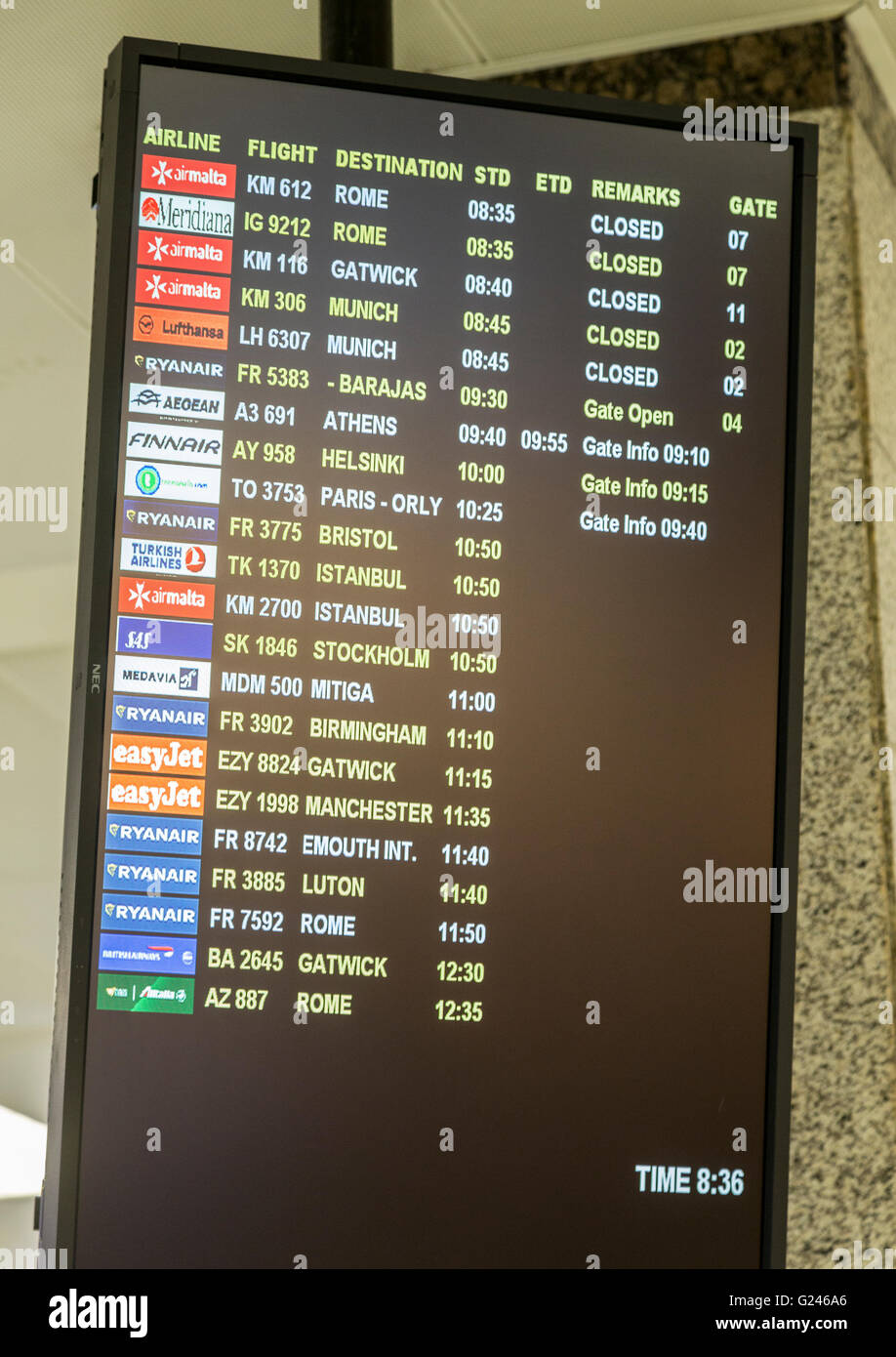 International flight departures board, Malta Stock Photo