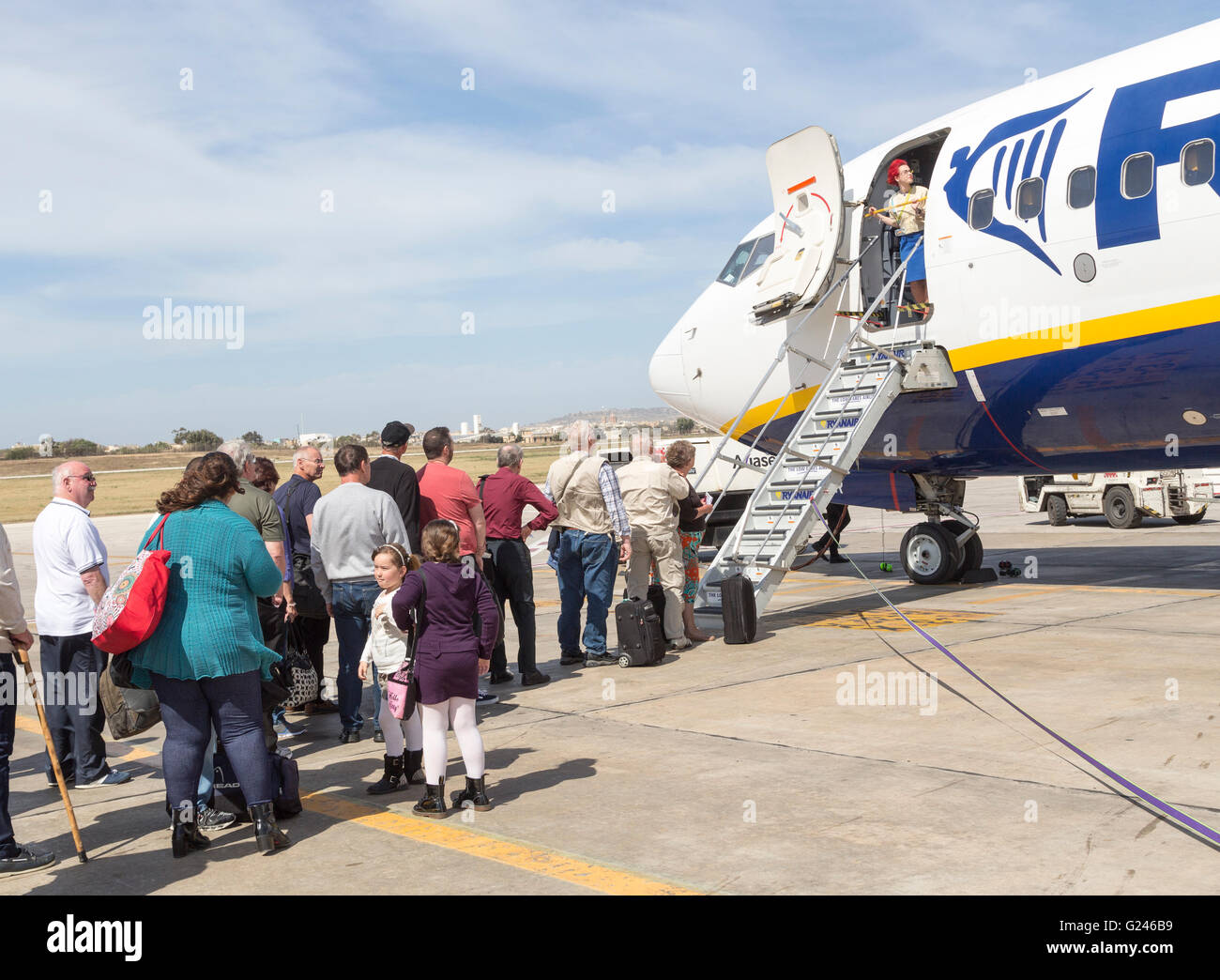 Passengers boarding a Ryanair flight, Malta Stock Photo