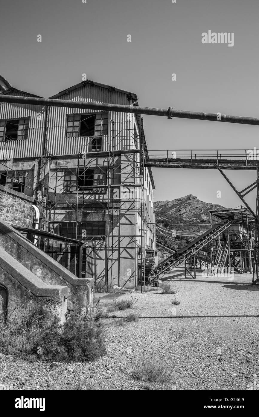 Industrial buildings and machine of abandoned Mine of Montevecchio in Sardinia, Arbus, Guspini, Italy Stock Photo