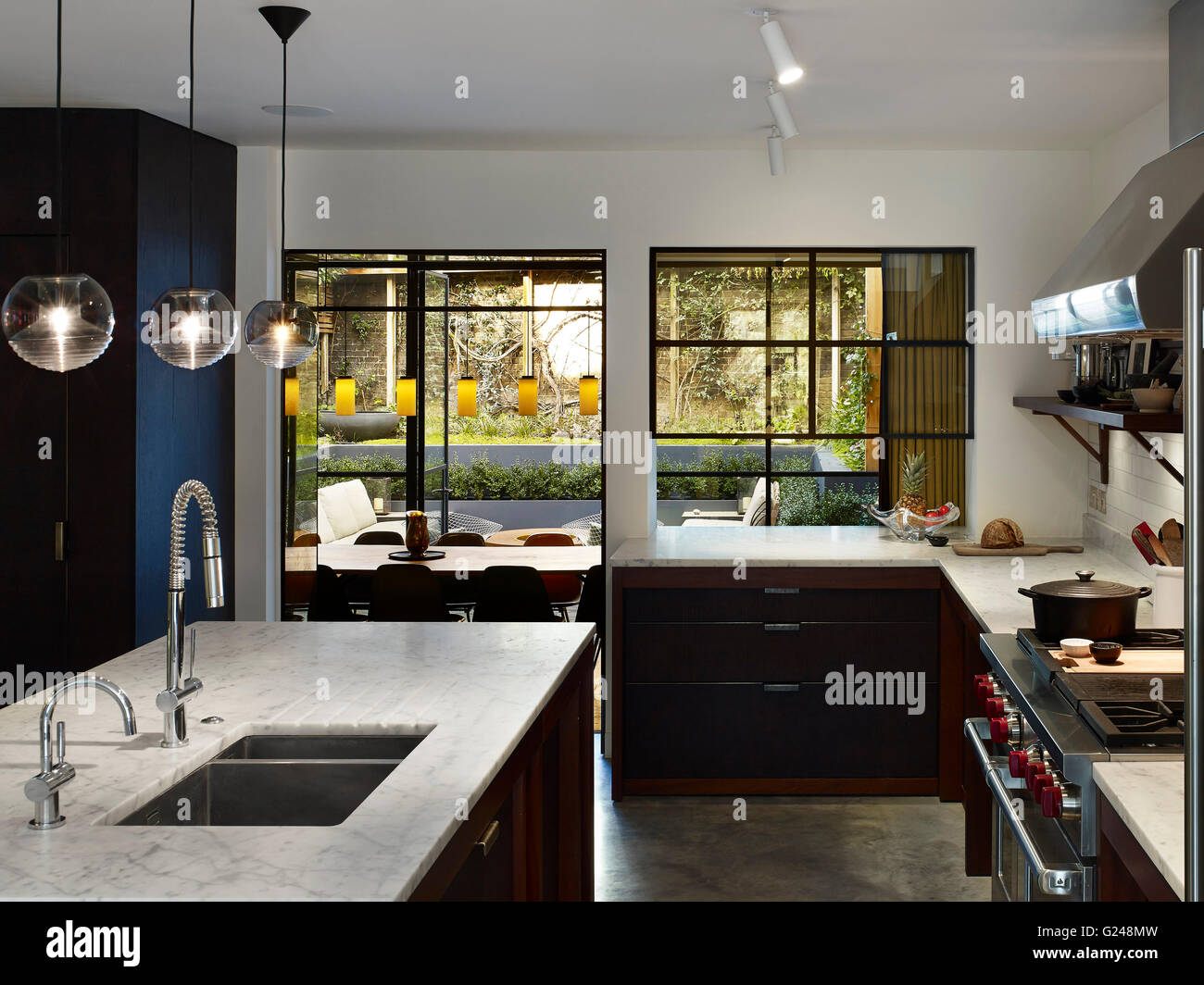 Kitchen and view. West London Villa, LONDON, United Kingdom. Architect