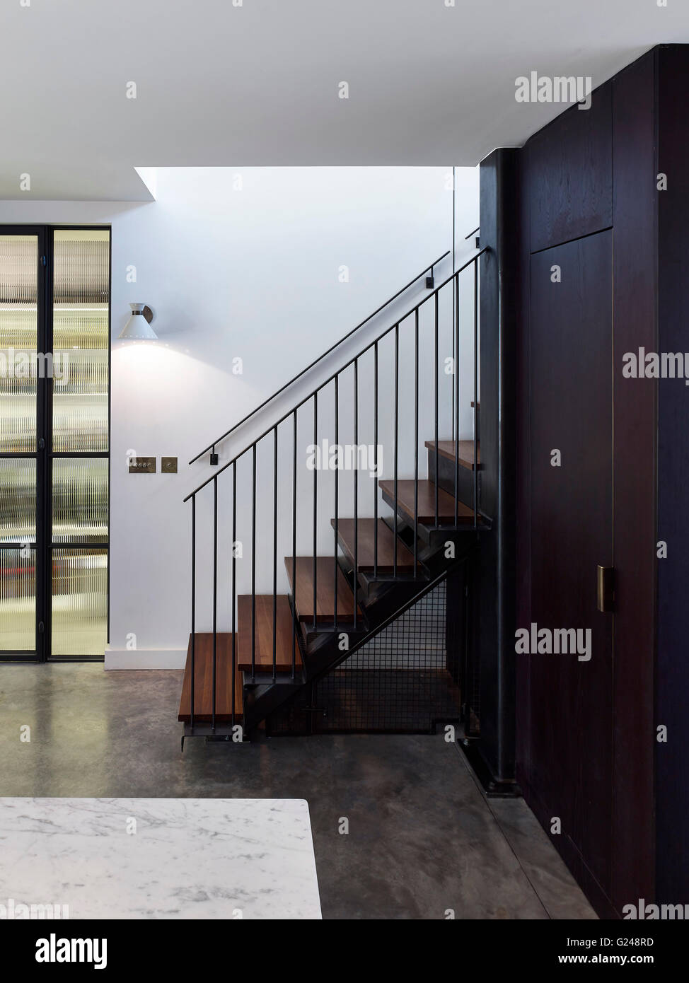 Partial view of stairway. West London Villa, LONDON, United Kingdom. Architect: Stiff + Trevillion Architects, 2015. Stock Photo