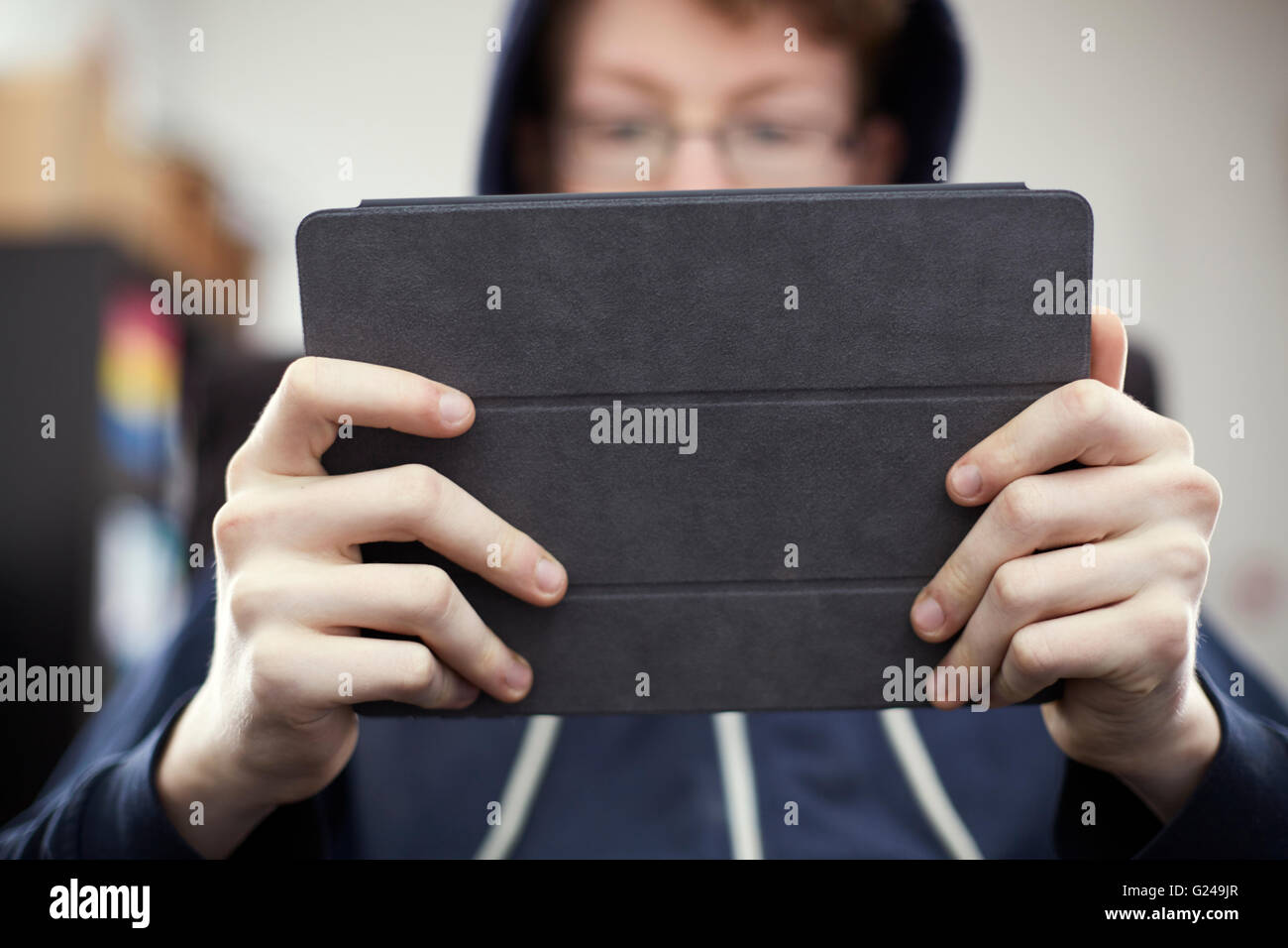 Man with Glasses using Apple iPad Stock Photo Alamy