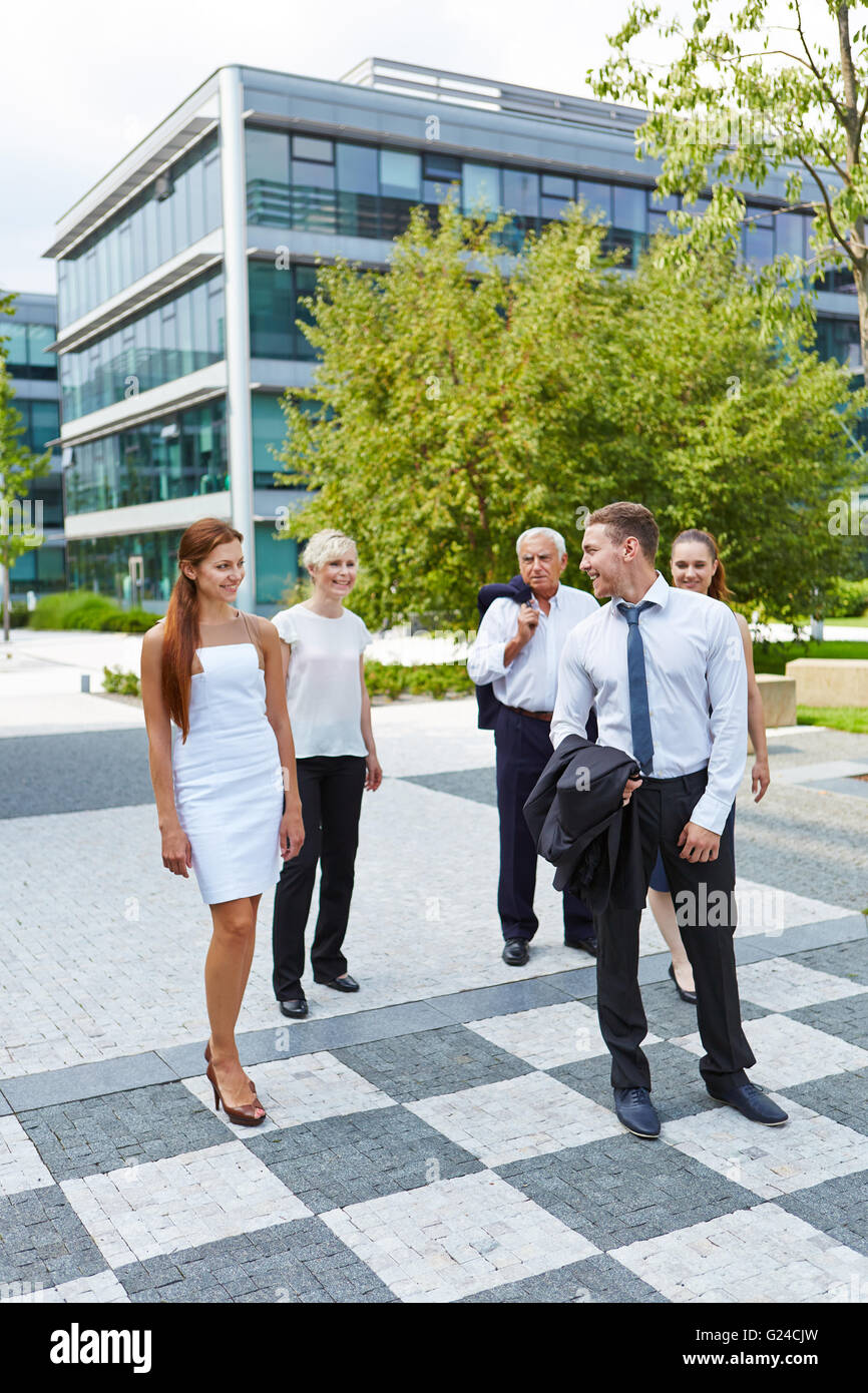 Successful business people walking together in a city Stock Photo - Alamy