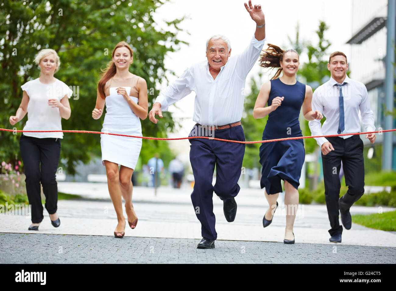 Business people running finish line hires stock photography and images