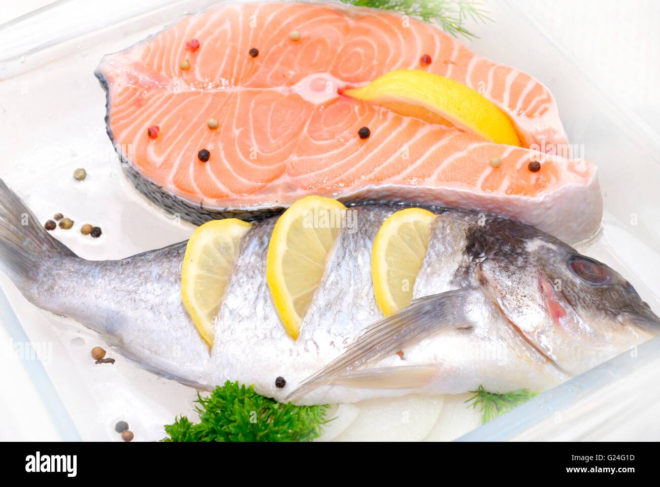 big salmon fish defrosting before cooking Stock Photo Alamy