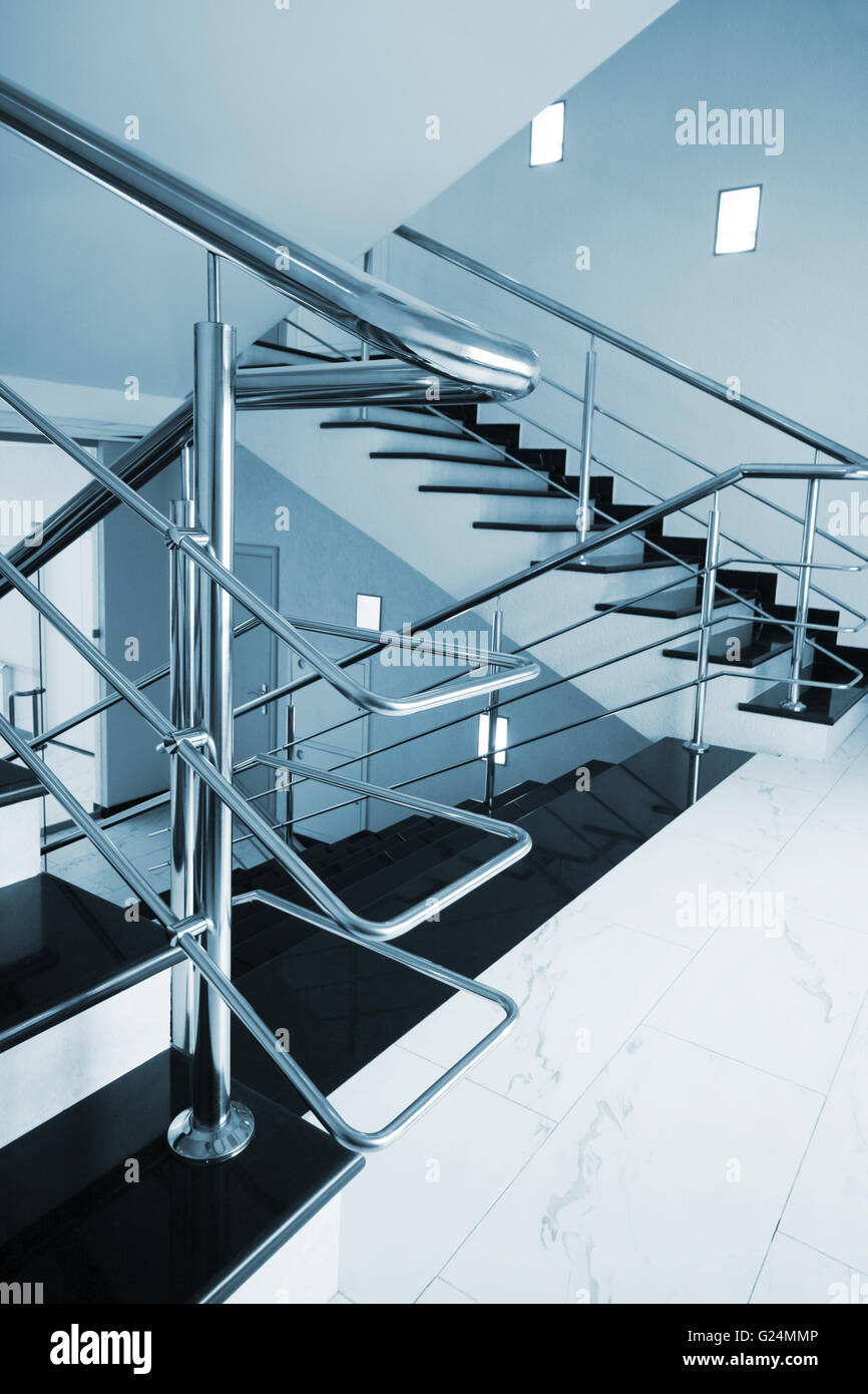 Marble staircase with a steel handrail in a modern building Stock Photo ...