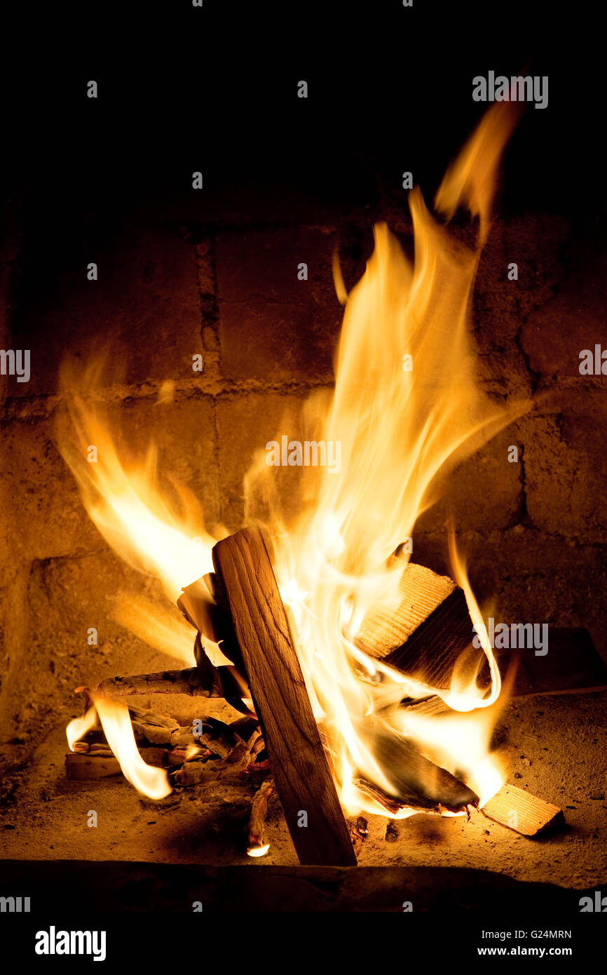 burning wood in a fireplace close up Stock Photo Alamy
