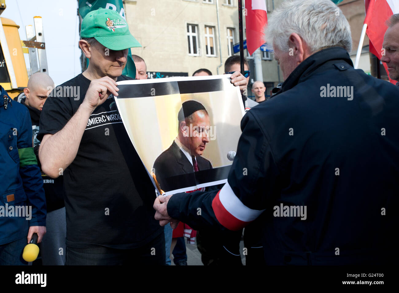 Wroclaw, Poland. 1st May, 2016. Roman Zielinski burns picture of Rafal Dutkiewicz during ONR protest in Wroclaw. Stock Photo