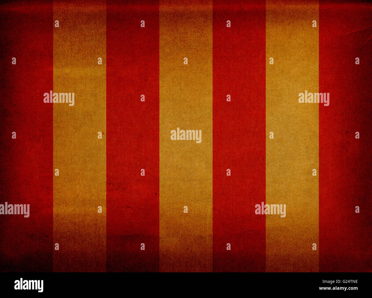 Red and yellow striped retro canvas deck chair cover Stock Photo - Alamy