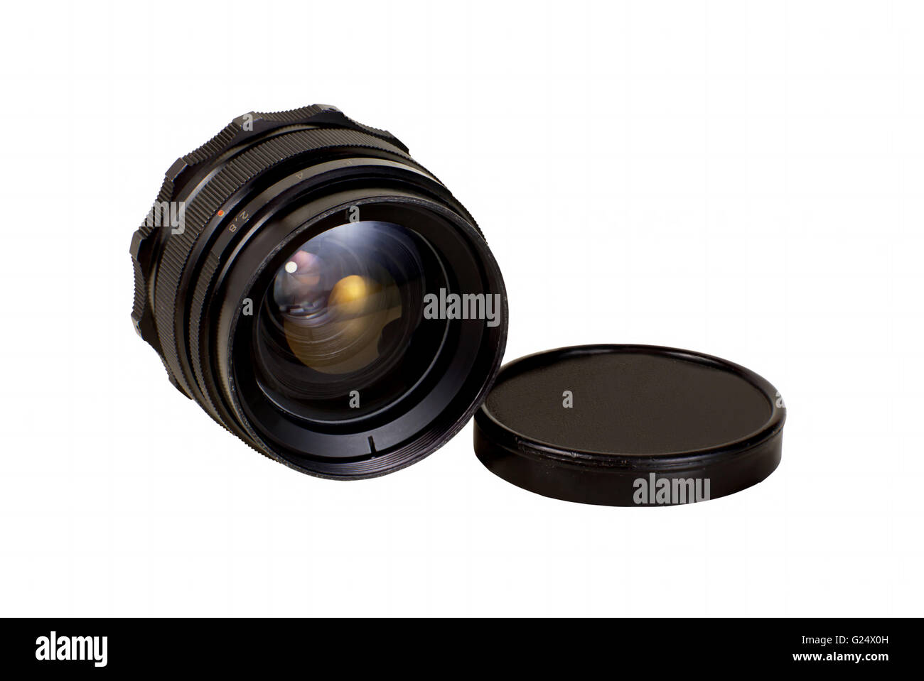 An old manual focus control camera lens isolated on white background with clipping paths Stock Photo