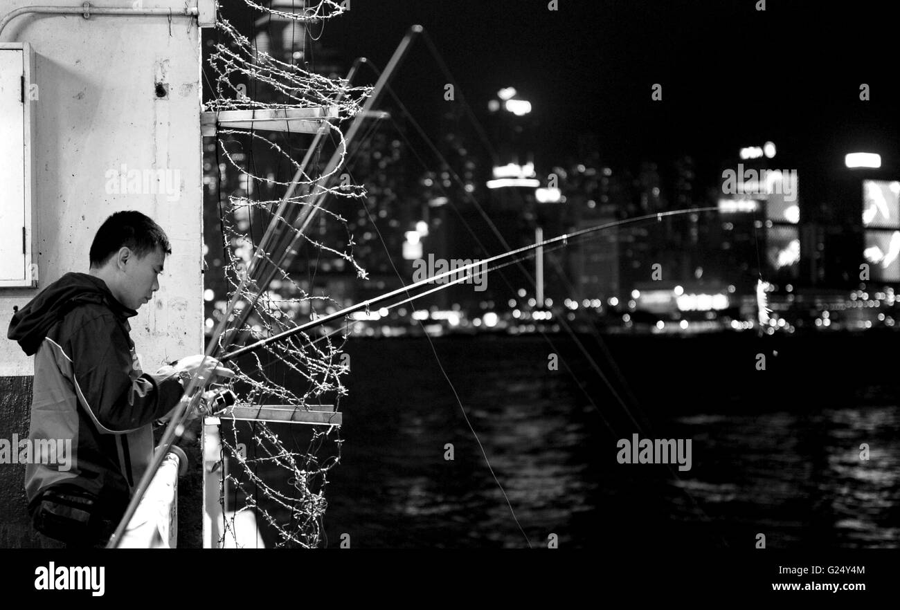 fishing in Hong Kong port Stock Photo